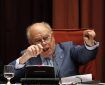 Catalonia's former president Jordi Pujol gestures during his response to the Committee on Institutional Affairs at Catalonia's Parliament in Barcelona September 26, 2014. Pujol, who is currently being investigated by the anti-corruption prosecutor's office, told the parliament on Friday he had never been a corrupt politician and that his overseas fortune was inherited from his father Florenci Pujol, the founder of Banca Catalana. REUTERS/Gustau Nacarino (SPAIN - Tags: POLITICS CRIME LAW)